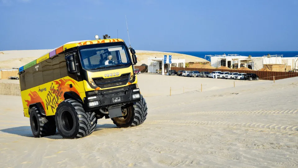 Monster Bus Tour in the Desert with Day Pass at Al Majles Resort - Image 1
